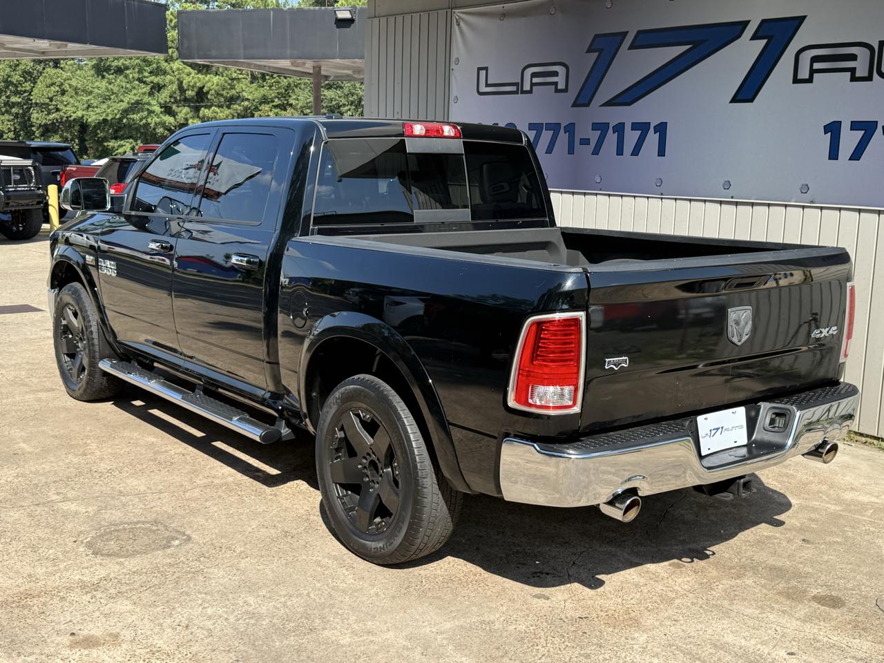 RAM 1500 4WD Crew Cab 140.5" Laramie 2014