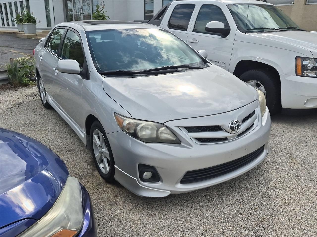 Silver 2011 Toyota Corolla Sedan Front-Wheel Drive Manual