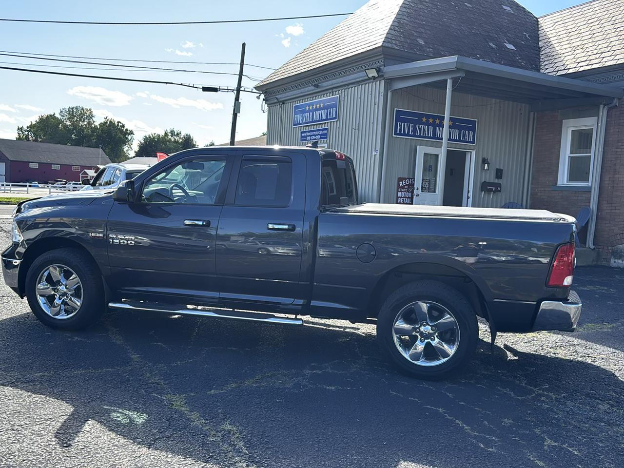 RAM 1500 4WD Quad Cab 140.5" Big Horn 2016