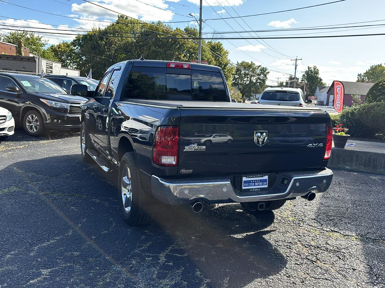 RAM 1500 4WD Quad Cab 140.5" Big Horn 2016