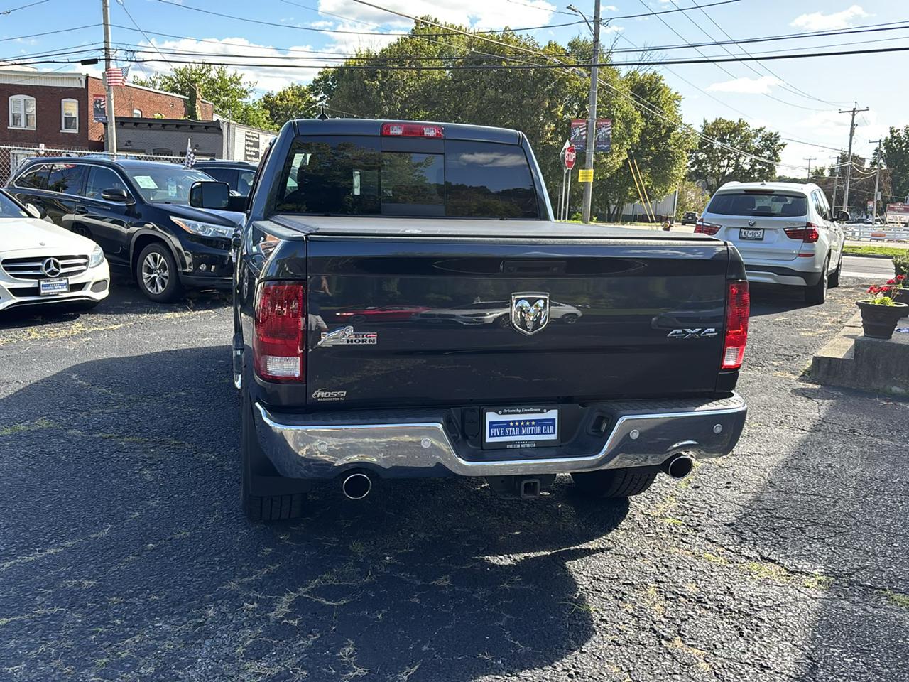 RAM 1500 4WD Quad Cab 140.5" Big Horn 2016