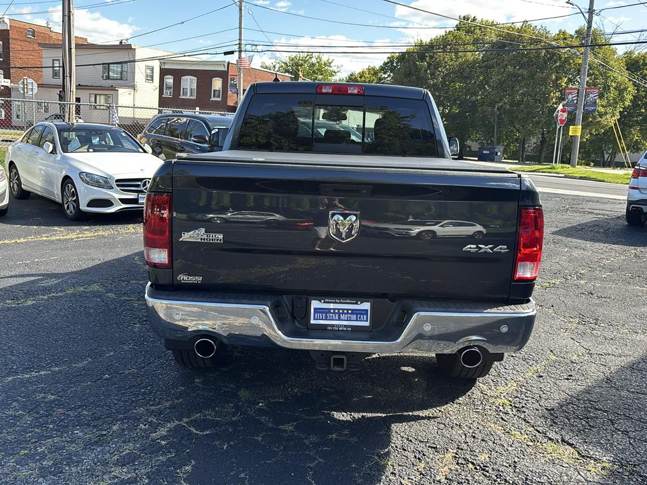 RAM 1500 4WD Quad Cab 140.5" Big Horn 2016