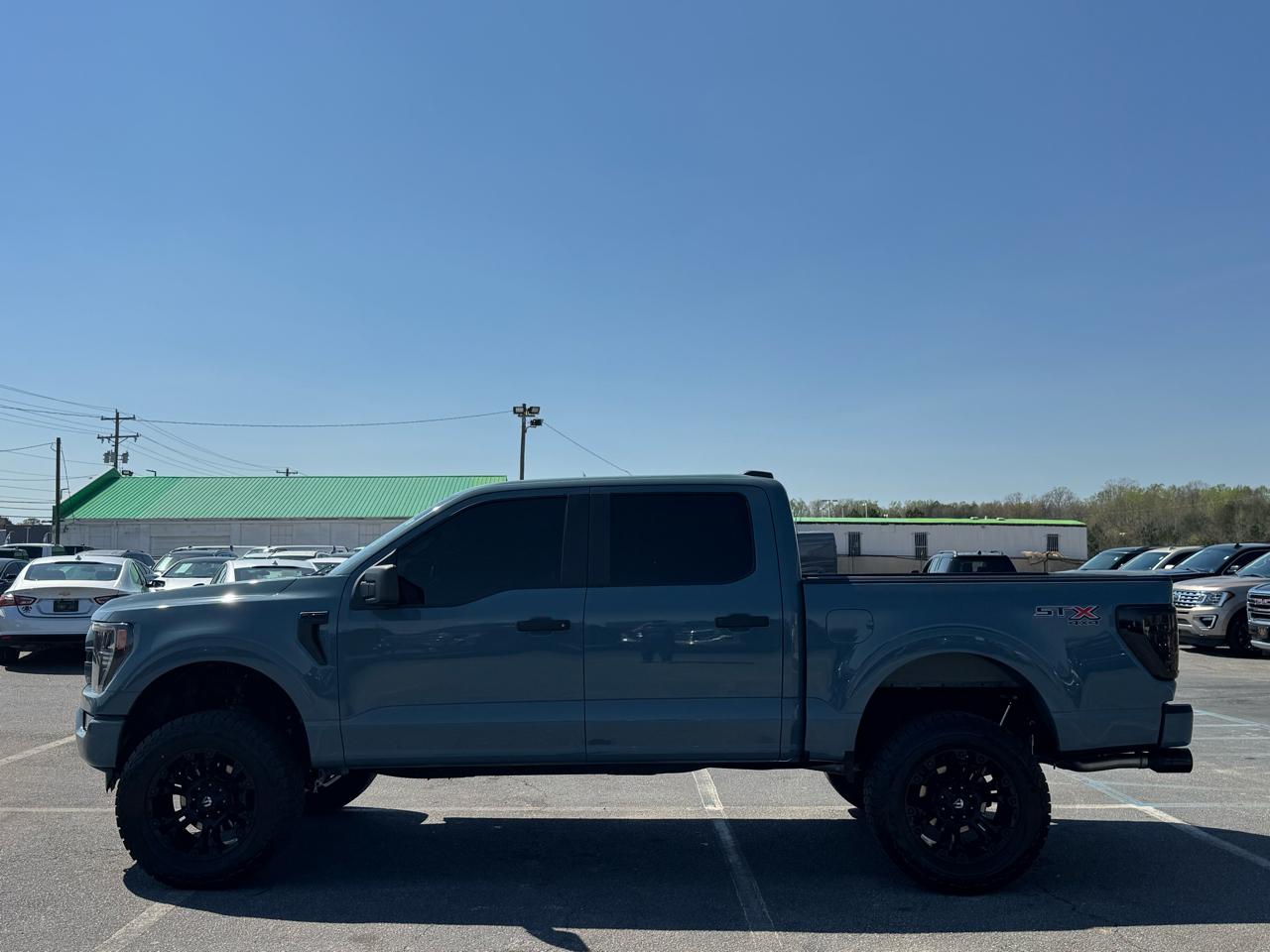 Ford F-150 4WD SuperCab 145" STX 2023