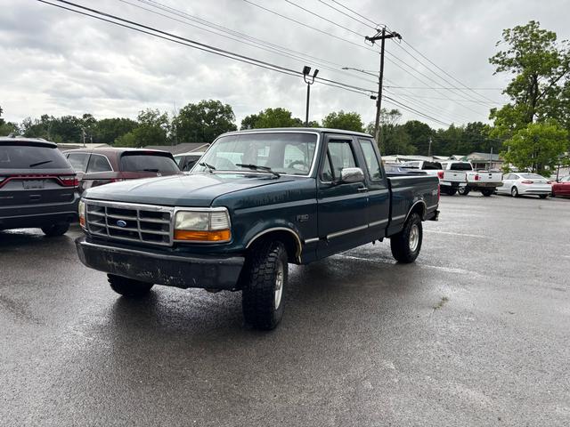 Blue 1995 Ford F-150 XLT 4WD Extended Cab LB Pickup Truck Four-Wheel Drive Automatic