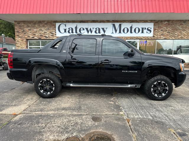 Black 2011 Chevrolet Avalanche Pickup Truck Four-Wheel Drive 4-Speed Automatic