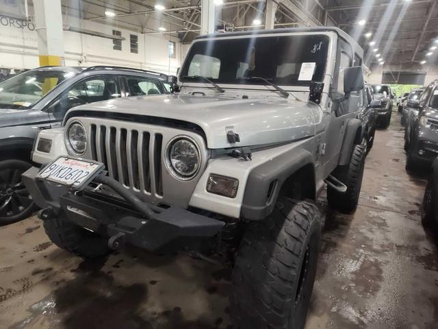 Silver 2001 Jeep Wrangler SE SUV / Crossover Four-Wheel Drive 5-Speed Manual