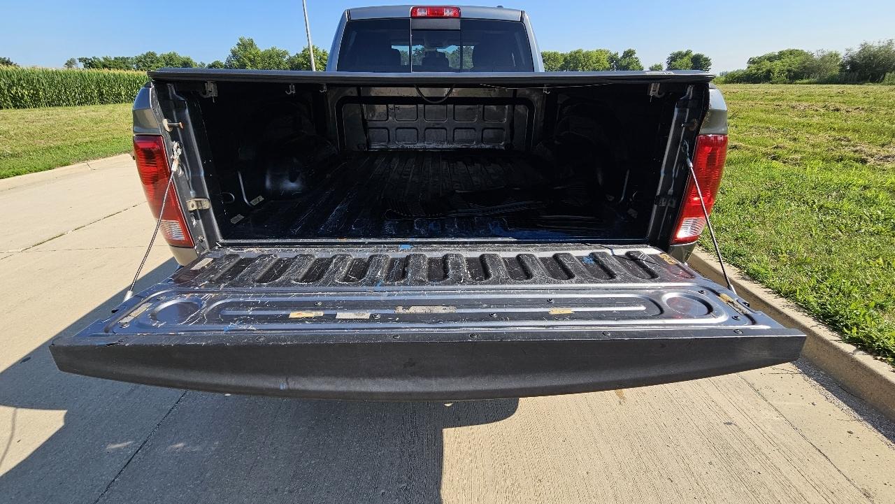 RAM 1500 4WD Quad Cab 140.5" SLT 2011