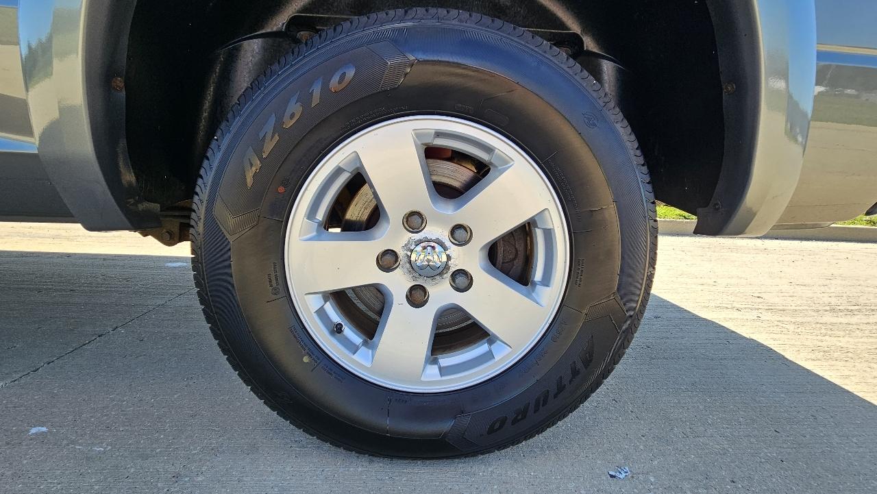 RAM 1500 4WD Quad Cab 140.5" SLT 2011