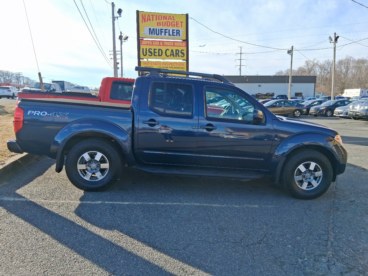 Nissan Frontier LE Crew Cab 4WD 2009