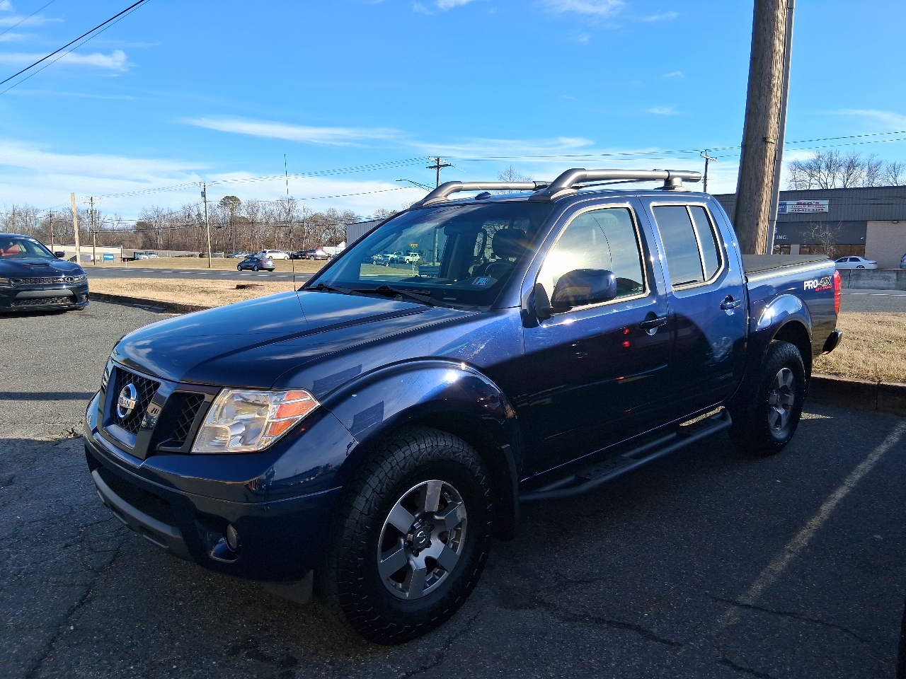 Nissan Frontier LE Crew Cab 4WD 2009