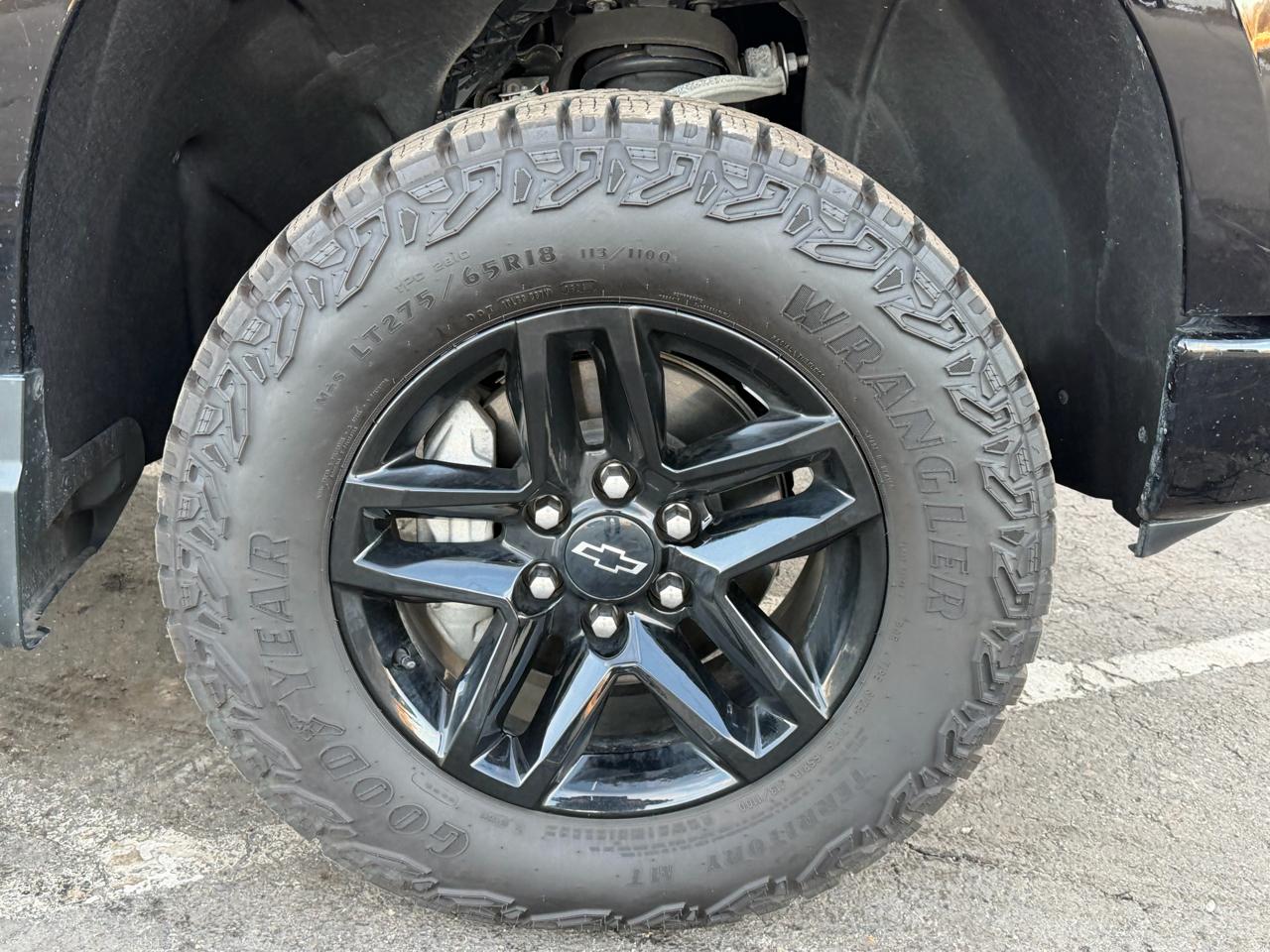 Chevrolet Silverado 1500 4WD Crew Cab 147" Custom Trail Boss 2024