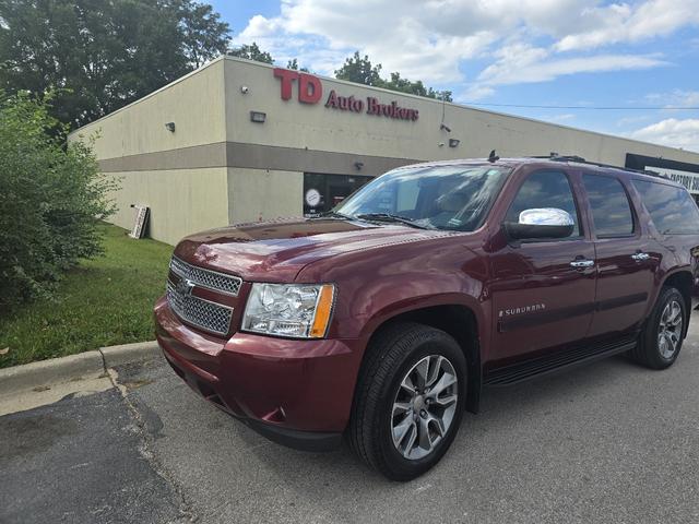 Red 2008 Chevrolet Suburban SUV / Crossover Four-Wheel Drive 4-Speed Automatic