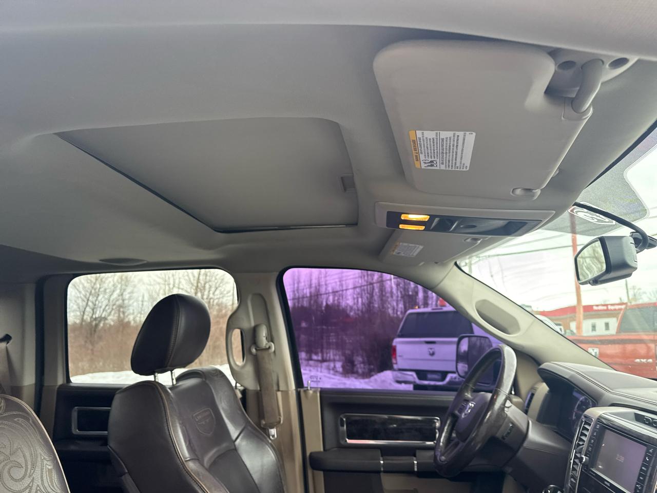 RAM 1500 4WD Crew Cab 140.5" Laramie Longhorn 2012