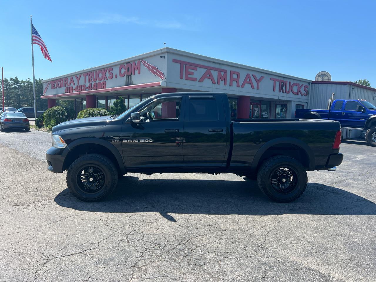 RAM 1500 4WD Quad Cab 140.5" Sport 2011