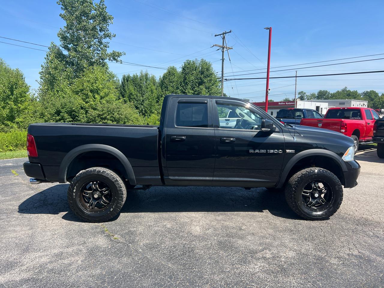 RAM 1500 4WD Quad Cab 140.5" Sport 2011