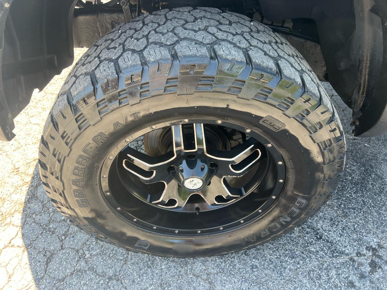 RAM 1500 4WD Quad Cab 140.5" Sport 2011