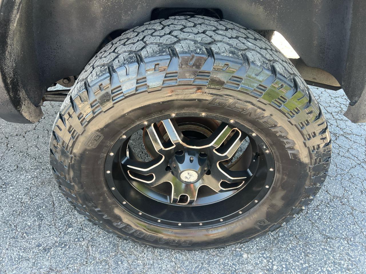 RAM 1500 4WD Quad Cab 140.5" Sport 2011