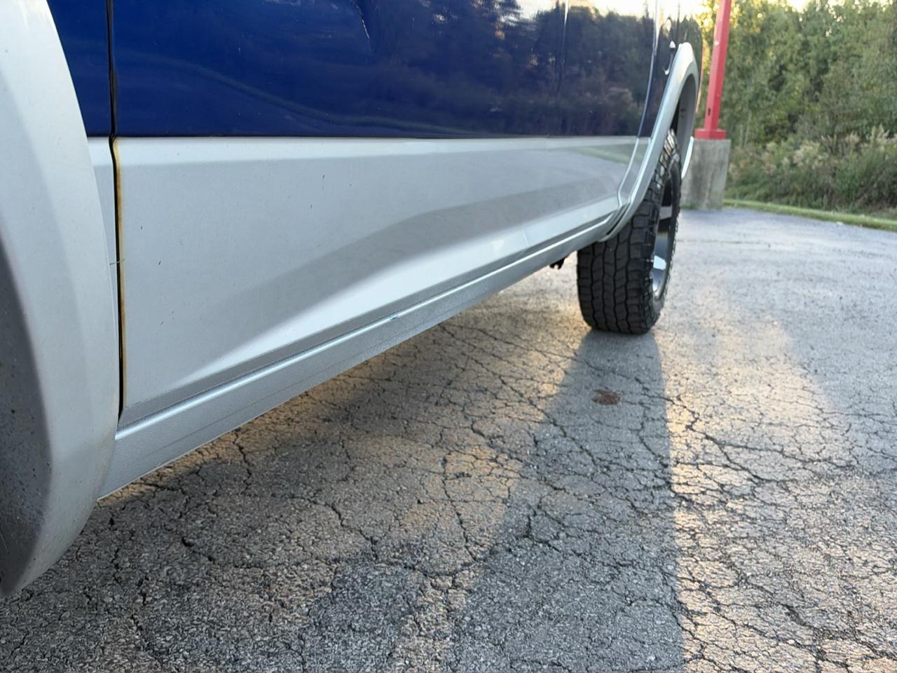 RAM 1500 4WD Crew Cab 140.5" Laramie 2014
