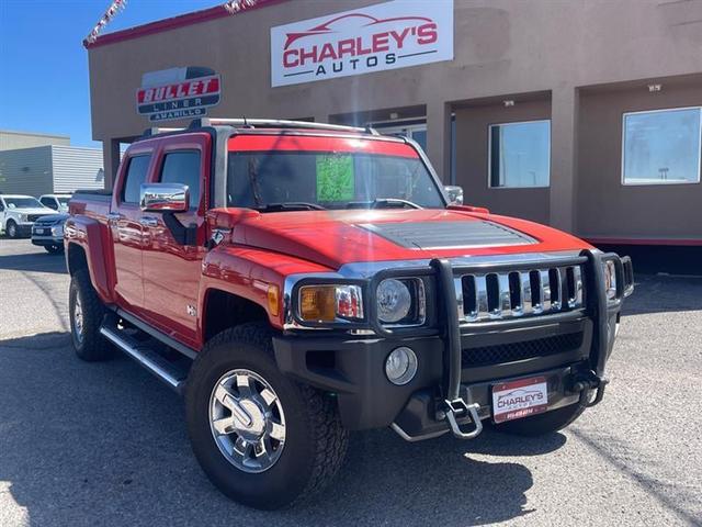 Orange 2009 Hummer H3T Alpha Pickup Truck Four-Wheel Drive Automatic