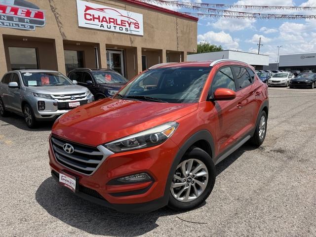 Orange 2017 Hyundai Tucson 2.0L SE FWD SUV / Crossover Front-Wheel Drive Automatic