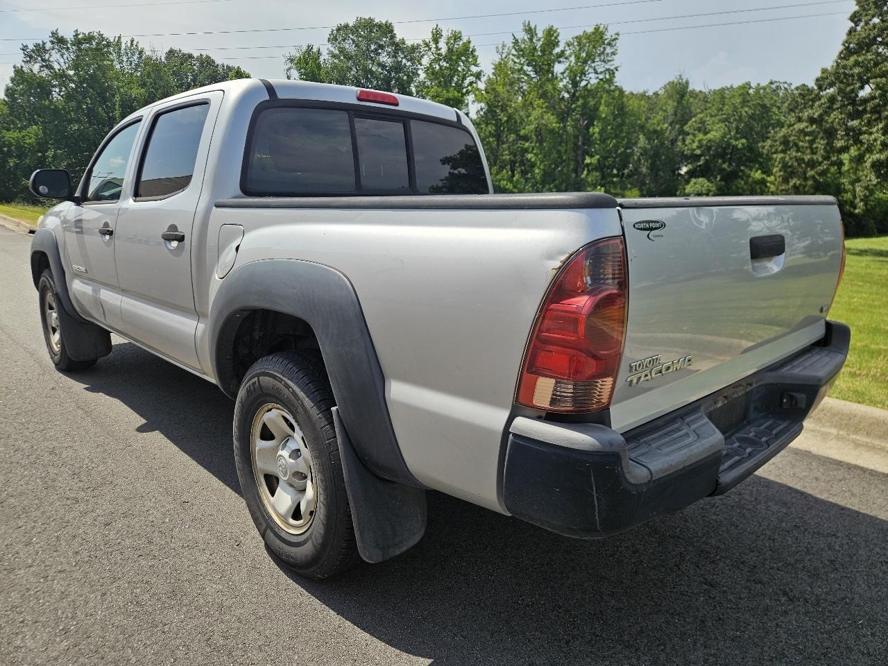 Toyota Tacoma 4WD Double Cab V6 MT (Natl) 2013
