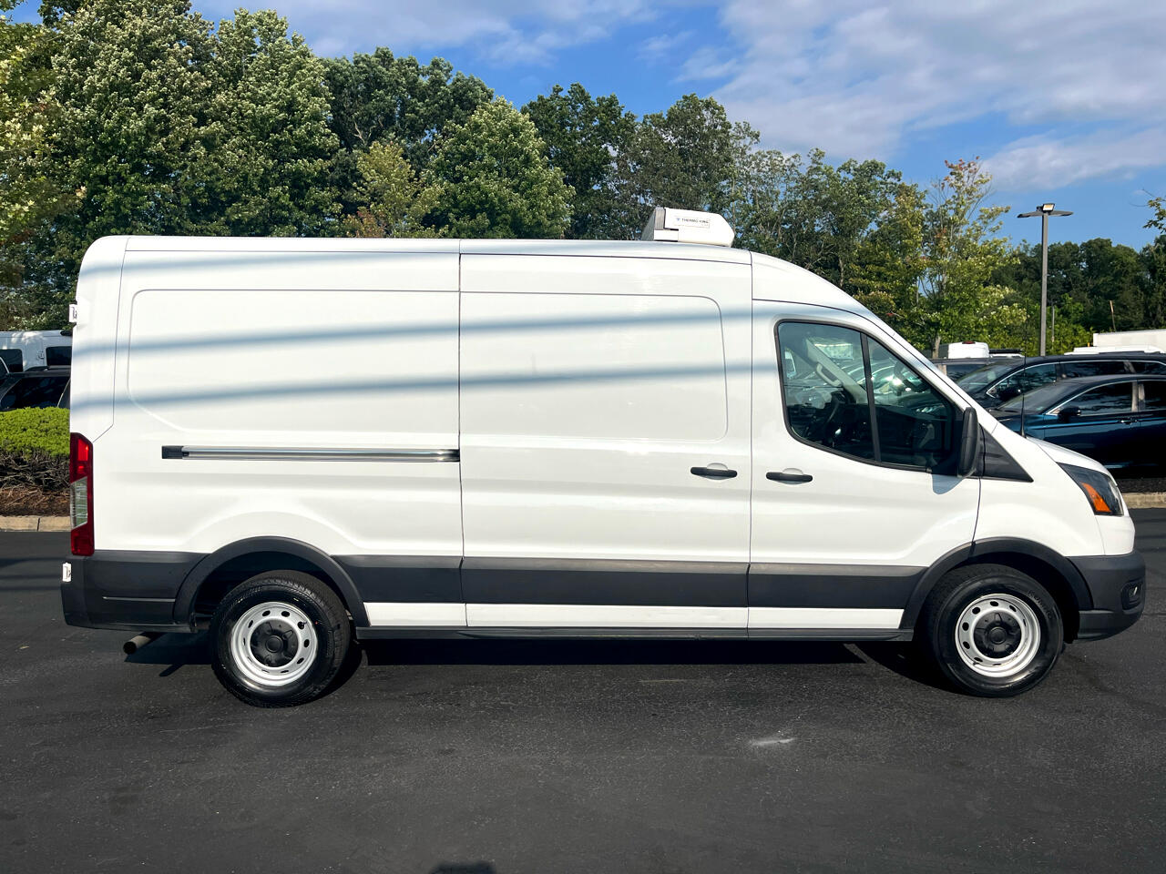 Ford Transit Cargo Van T-150 148" Med Rf 8670 GVWR RWD 2021