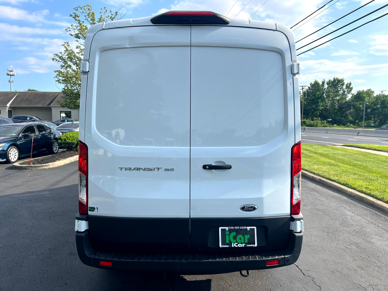 Ford Transit Cargo Van T-150 148" Med Rf 8670 GVWR RWD 2021