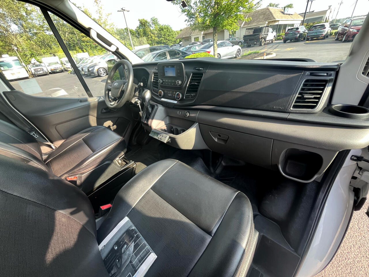 Ford Transit Cargo Van T-150 148" Med Rf 8670 GVWR RWD 2021