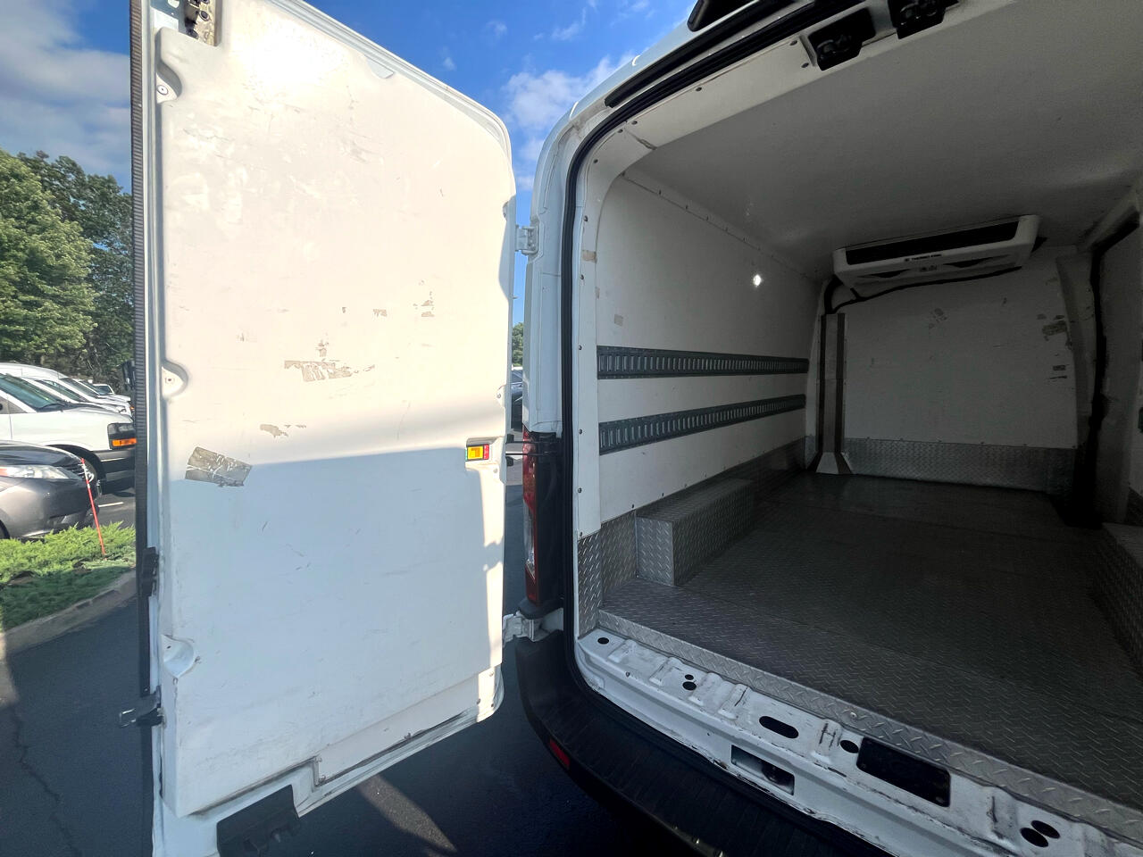 Ford Transit Cargo Van T-150 148" Med Rf 8670 GVWR RWD 2021