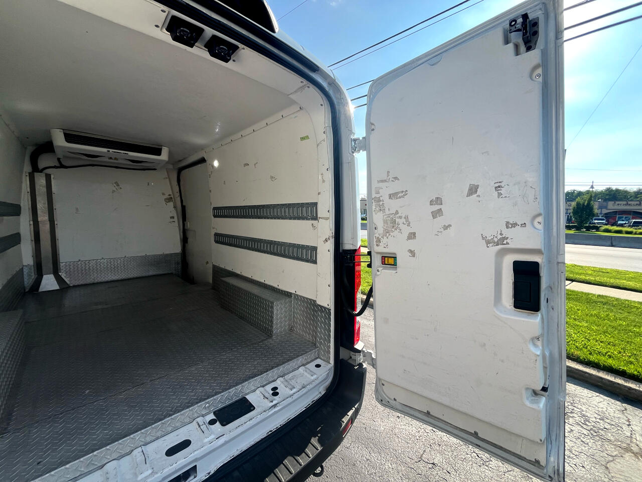 Ford Transit Cargo Van T-150 148" Med Rf 8670 GVWR RWD 2021