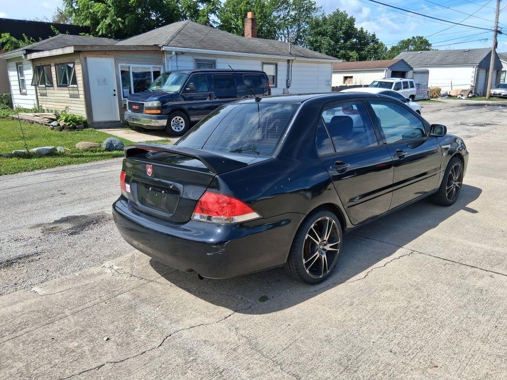 Mitsubishi Lancer  2004