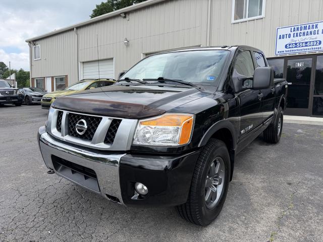 Black 2015 Nissan Titan Pickup Truck Four-Wheel Drive 5-Speed Automatic