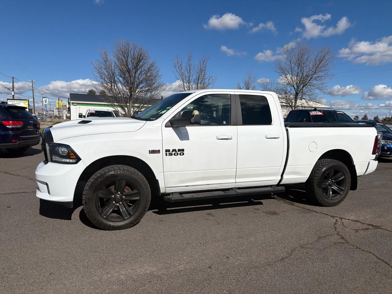 RAM 1500 4WD Quad Cab 140.5" Sport 2017