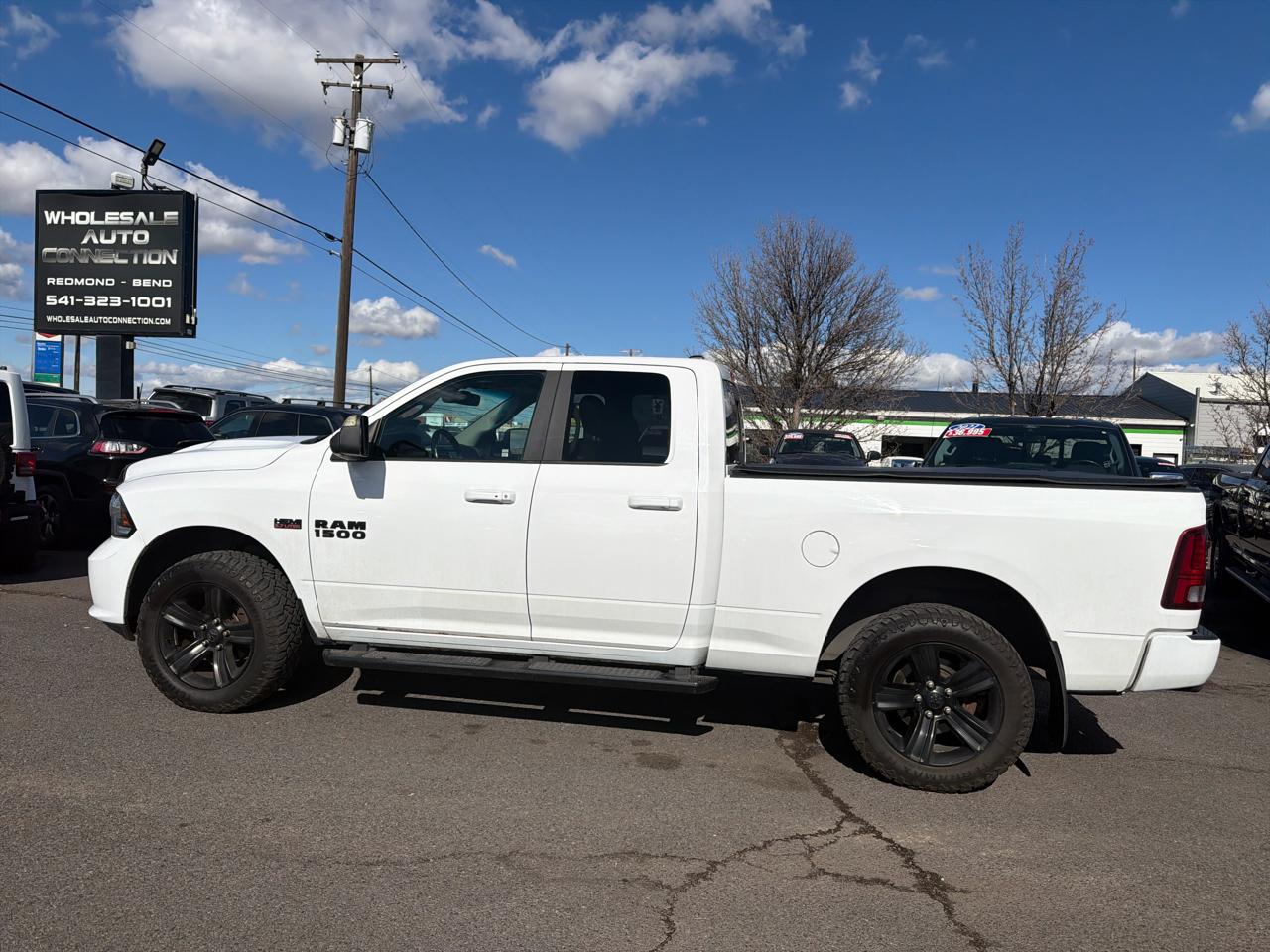 RAM 1500 4WD Quad Cab 140.5" Sport 2017