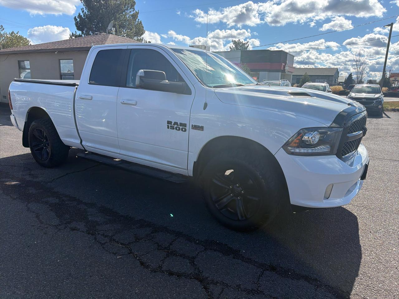 RAM 1500 4WD Quad Cab 140.5" Sport 2017