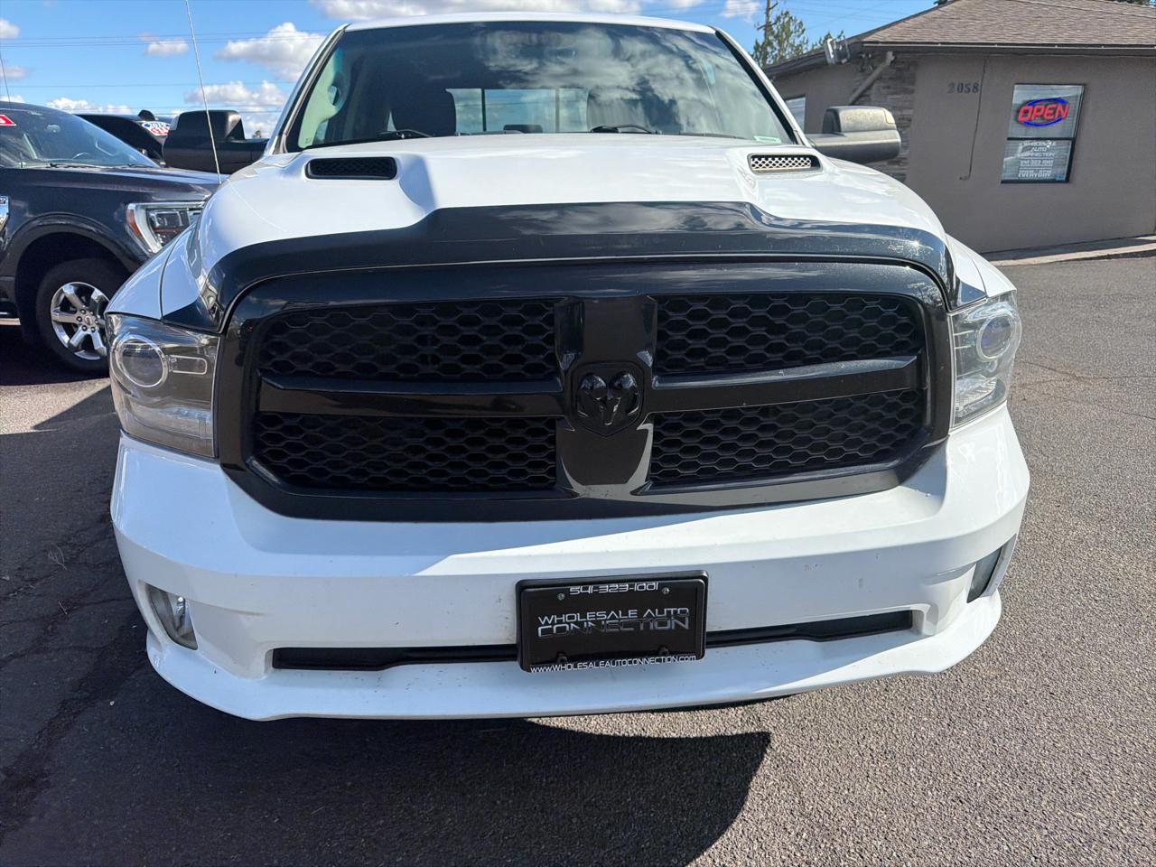 RAM 1500 4WD Quad Cab 140.5" Sport 2017