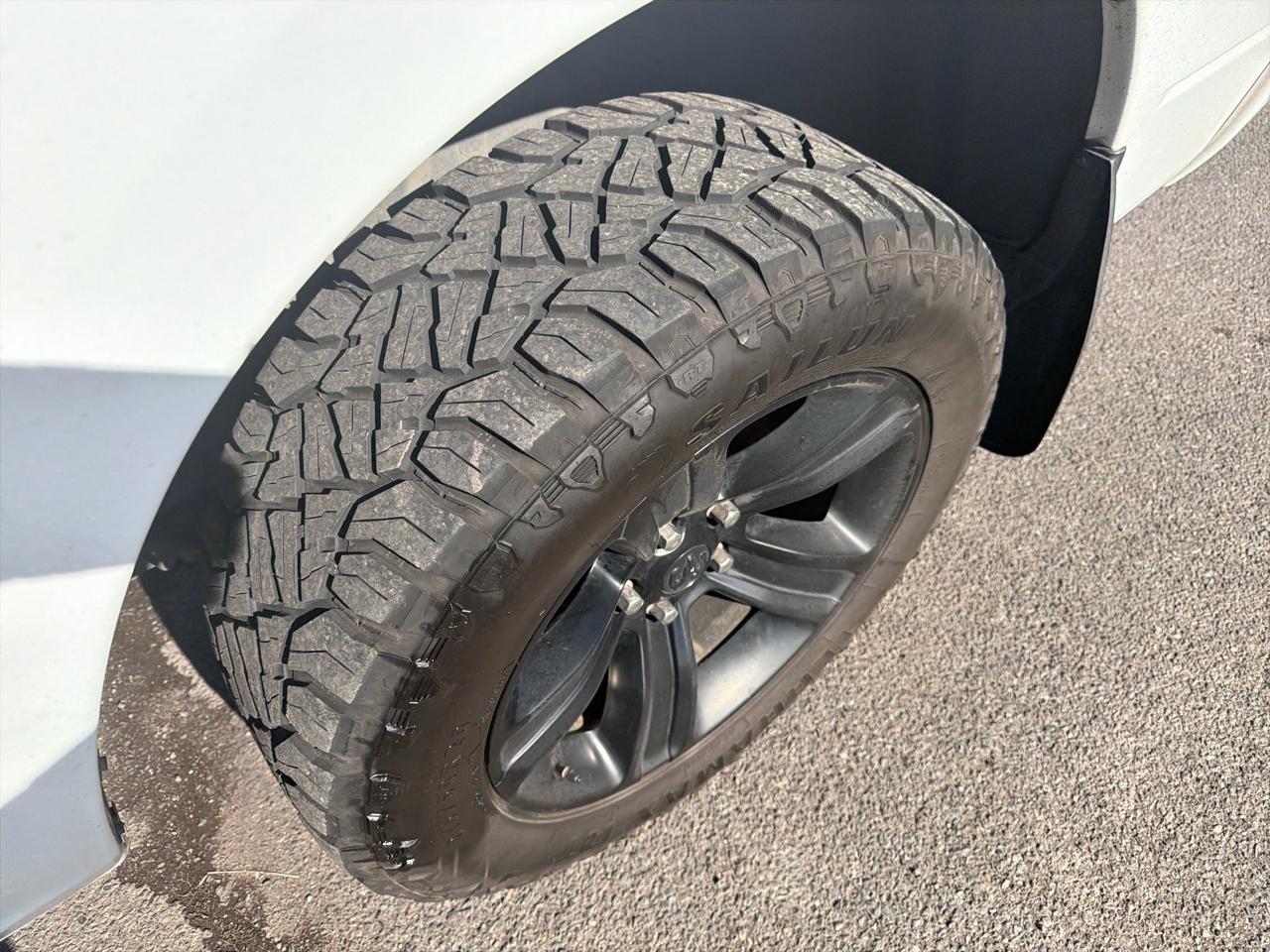 RAM 1500 4WD Quad Cab 140.5" Sport 2017