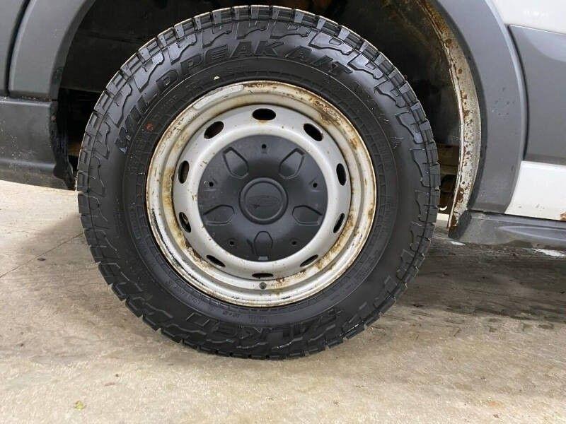 Ford Transit 150 Van Low Roof 60/40 Pass. 148-in. WB 2015
