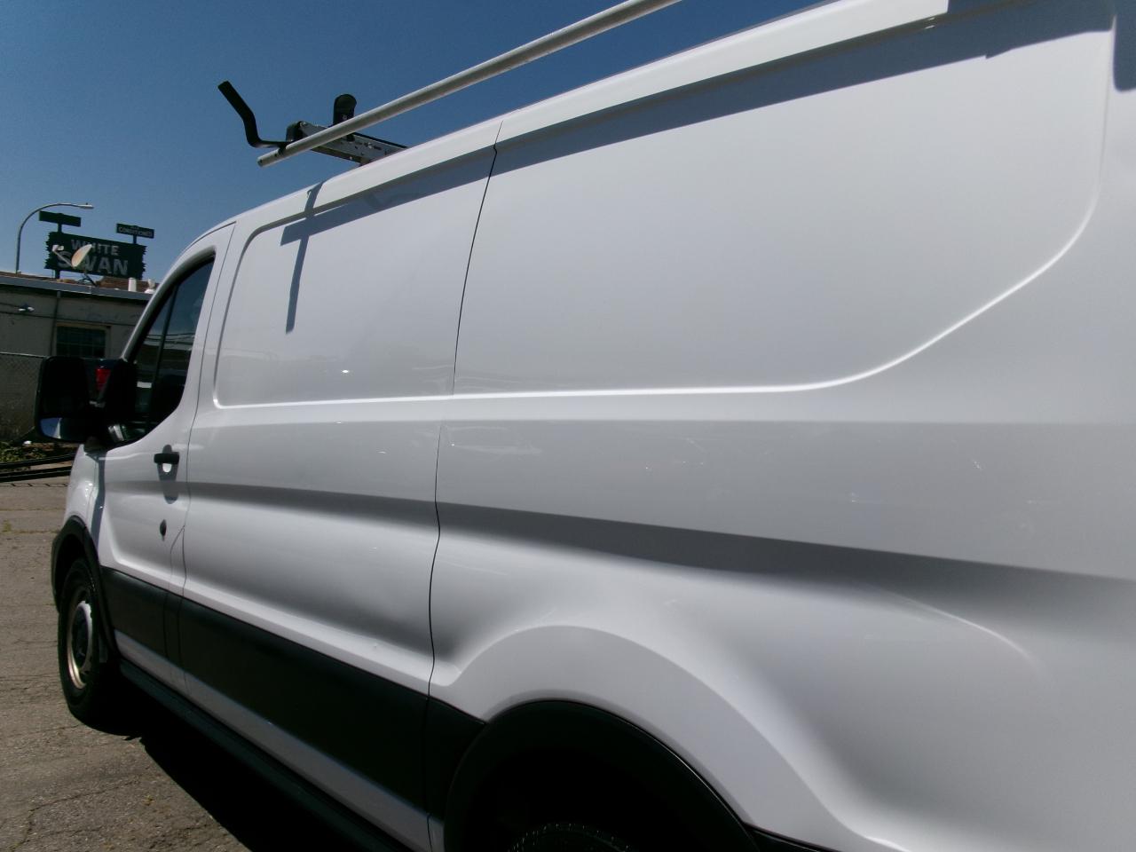 Ford Transit Cargo Van T-150 130" Low Rf 8670 GVWR RWD 2021