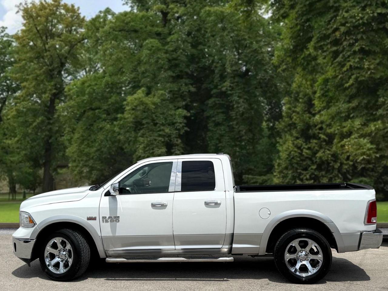 RAM 1500 4WD Quad Cab 140.5" Laramie 2016