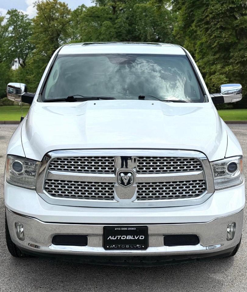 RAM 1500 4WD Quad Cab 140.5" Laramie 2016