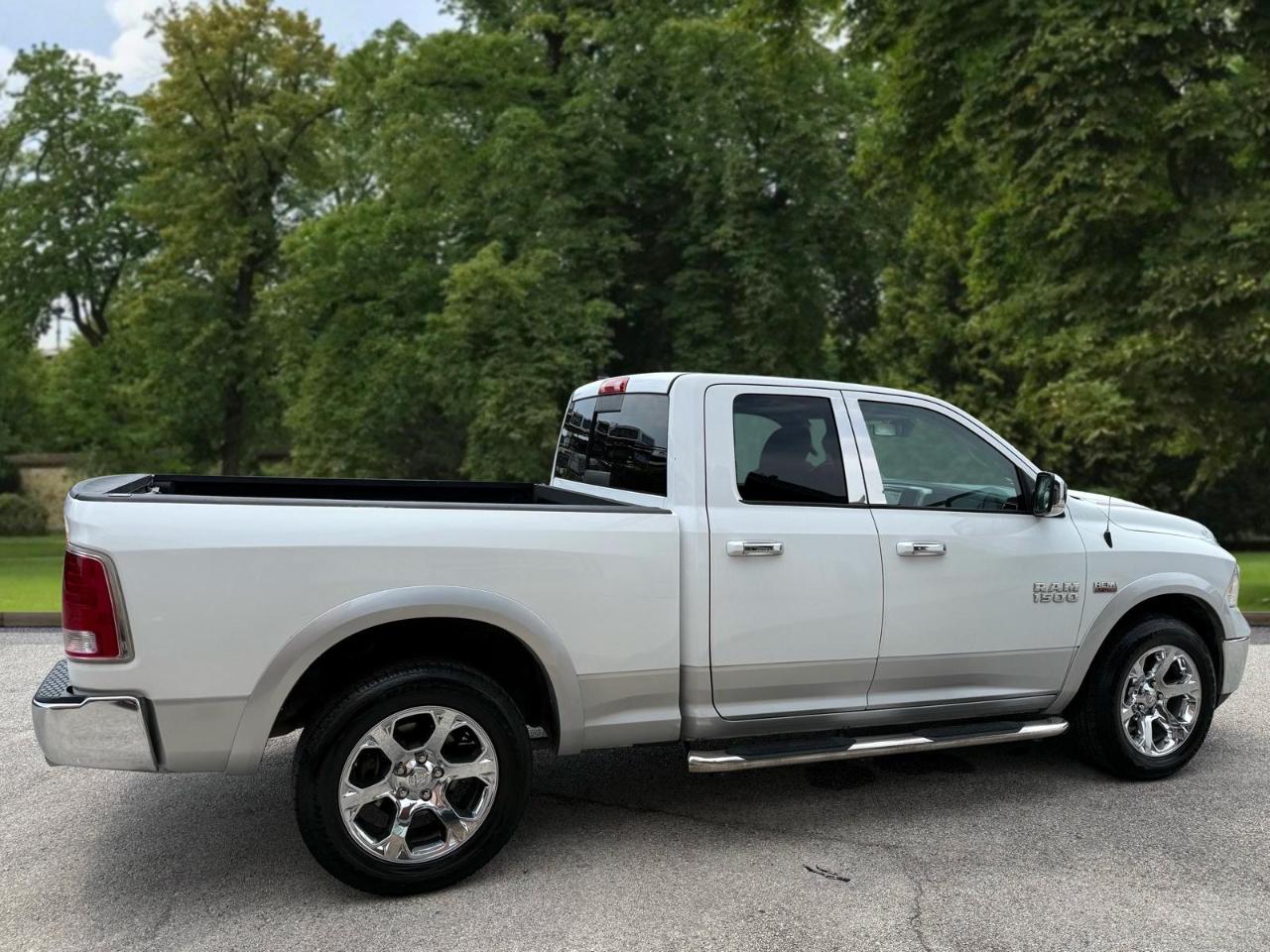 RAM 1500 4WD Quad Cab 140.5" Laramie 2016