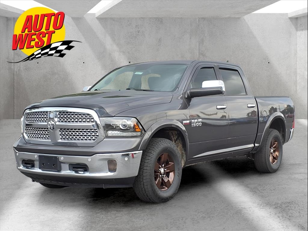2015 RAM 1500 4WD Crew Cab 140.5" Laramie