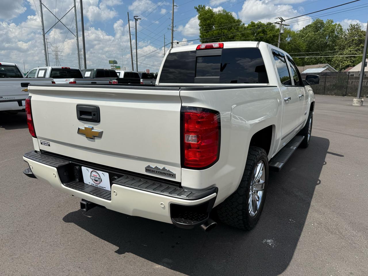 Chevrolet Silverado 1500 4WD Crew Cab 143.5" High Country 2015