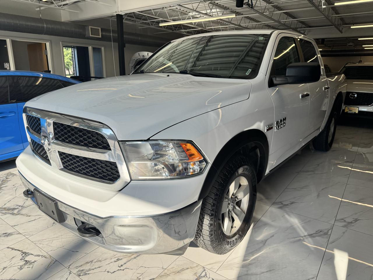 RAM 1500 4WD Crew Cab 140.5" SLT 2016