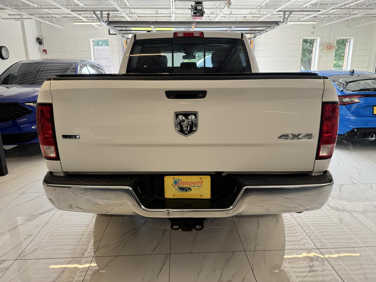 RAM 1500 4WD Crew Cab 140.5" SLT 2016