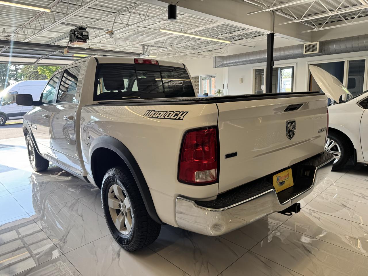 RAM 1500 4WD Crew Cab 140.5" SLT 2016