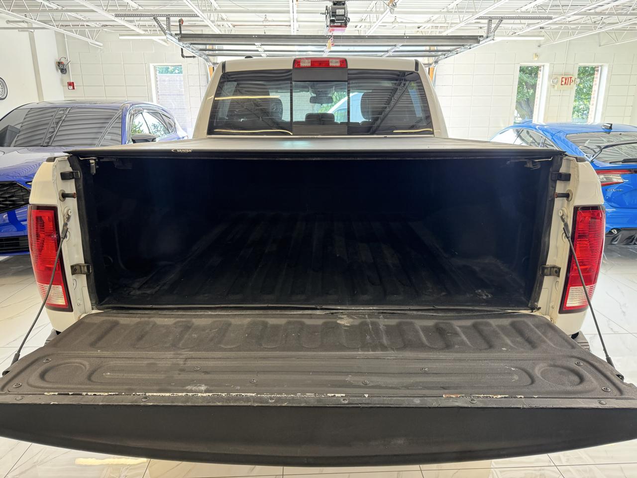 RAM 1500 4WD Crew Cab 140.5" SLT 2016