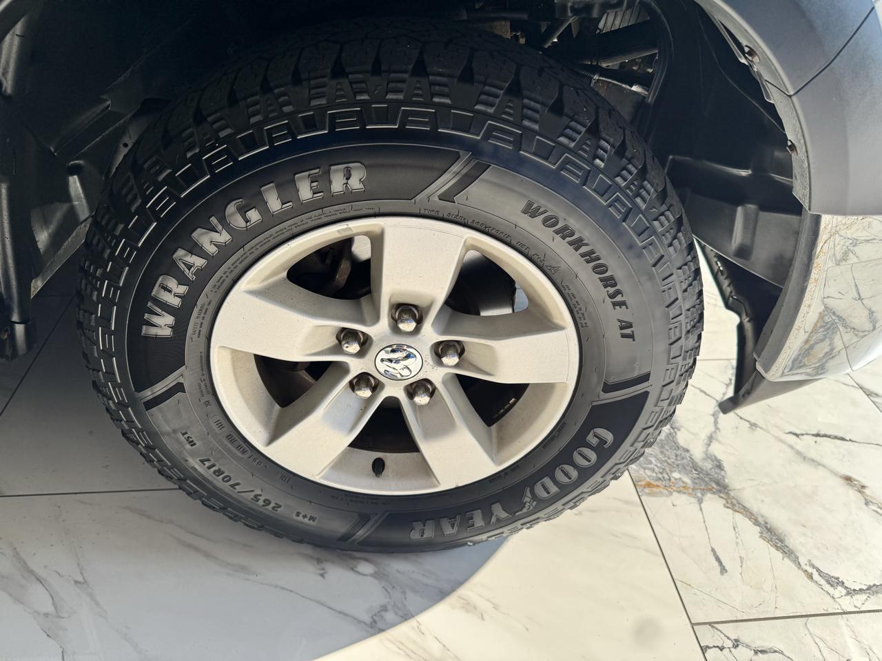 RAM 1500 4WD Crew Cab 140.5" SLT 2016