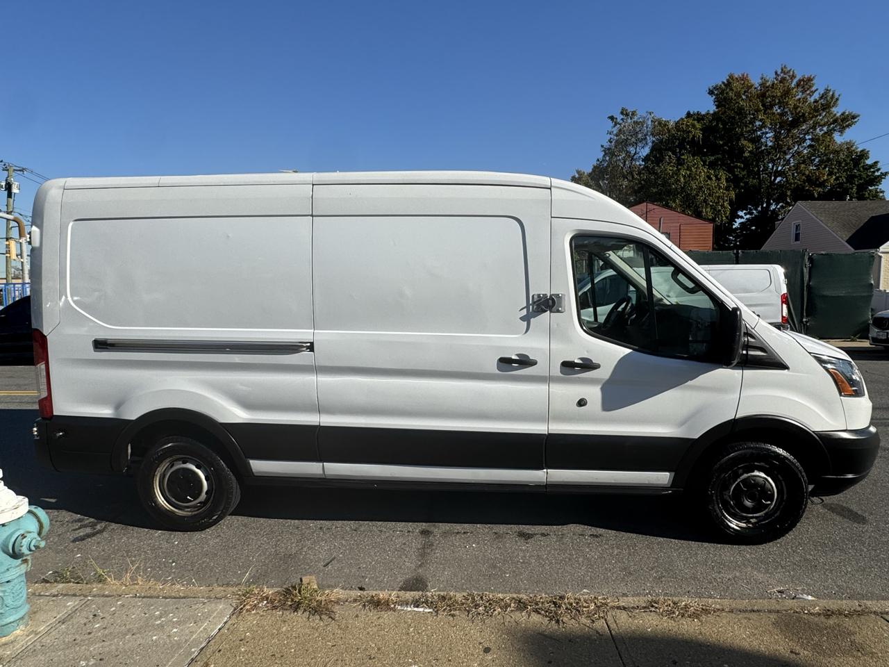 Ford Transit 150 Van Med. Roof w/Sliding Pass. 148-in. WB 2019